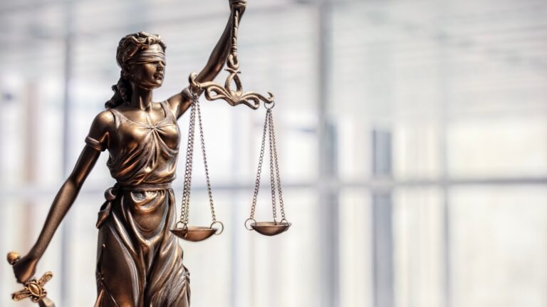 statue of Lady Justice with scales of justice