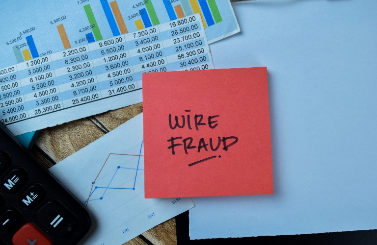 Wire Fraud is written on sticky notes