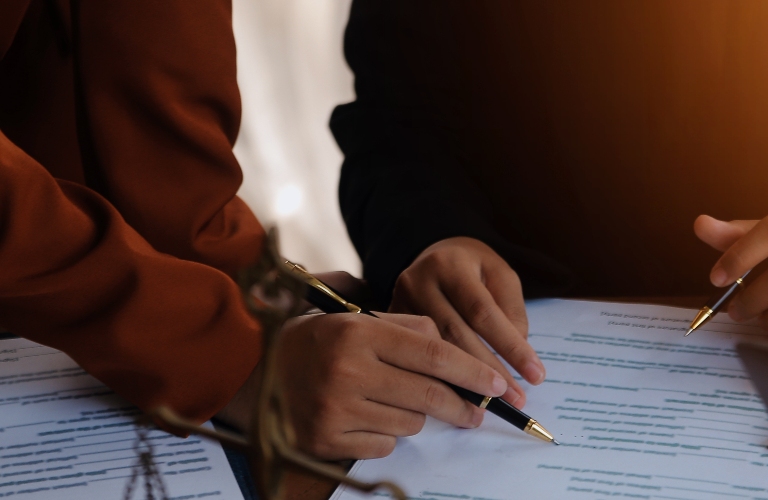 Lawyer and client are reviewing documents